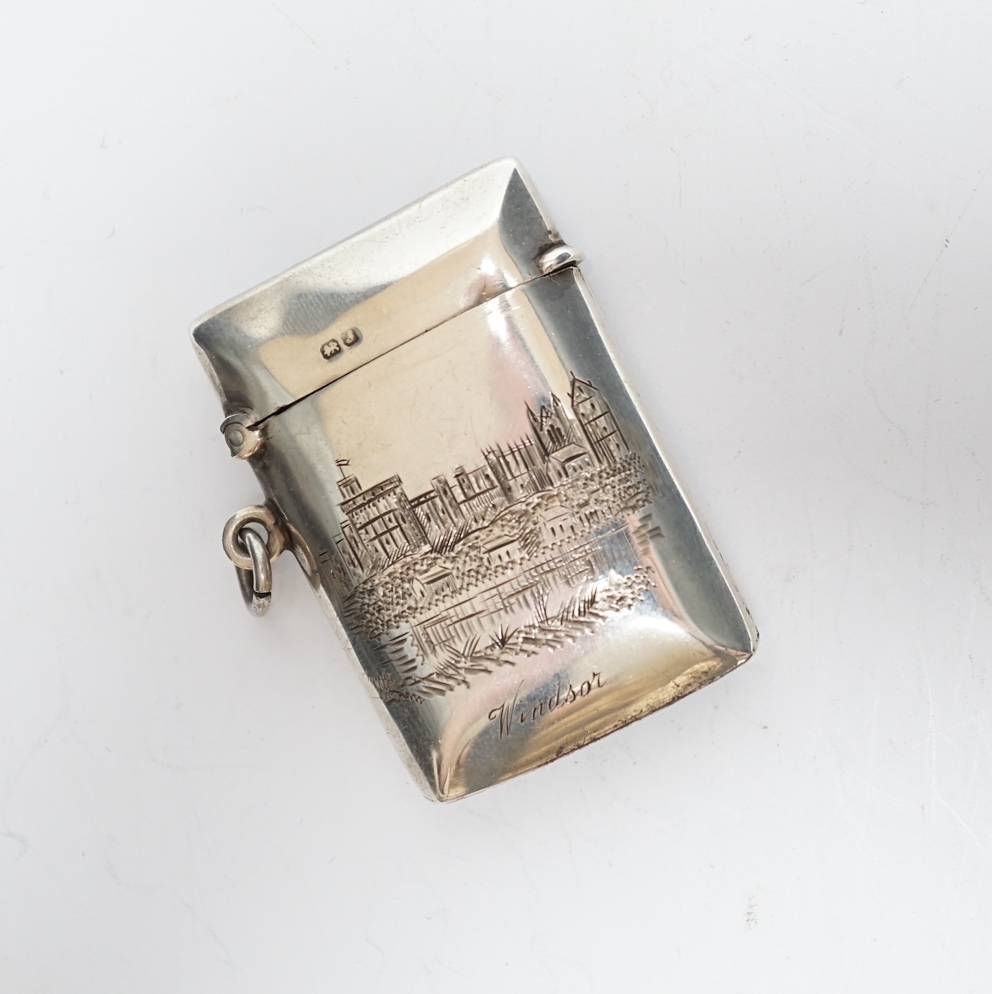 An early 20th century silver vesta case, engraved with scene of Windsor Castle, John Milward Banks, Chester, 1909?, 50mm.